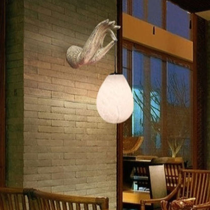 Applique avec main et boule lumineuse Wall lamps Electro Paris