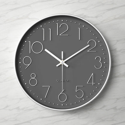 Horloge murale élégante et silencieuse avec chiffres en relief Wall clock Electro Paris L