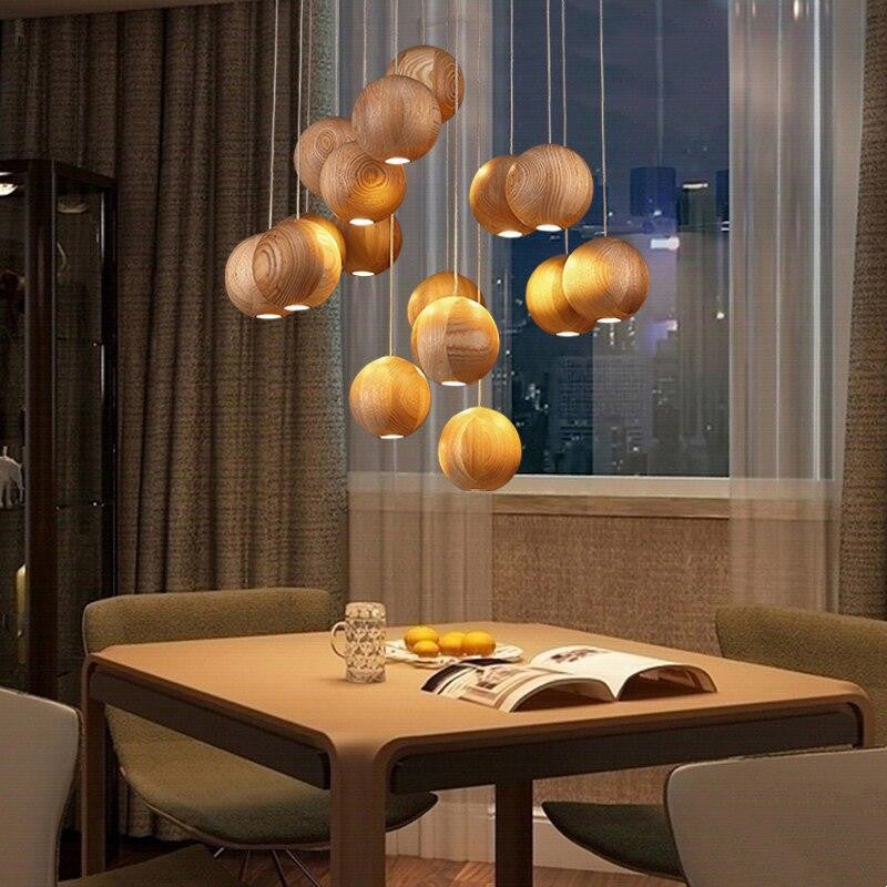 Suspension globe en bois naturel avec longueur de suspension réglable Ceiling Lamp Electro Paris