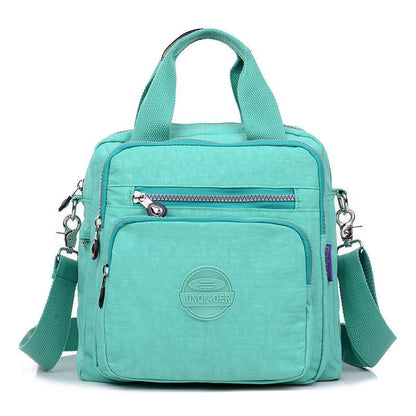 Sac Bandoulière 4-en-1 Polyvalent Pour Femme Avec Design Élégant Et Modulable Cross Body Bags Electro Paris Bleu menthe